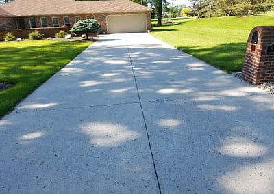 Driveway after power washing.